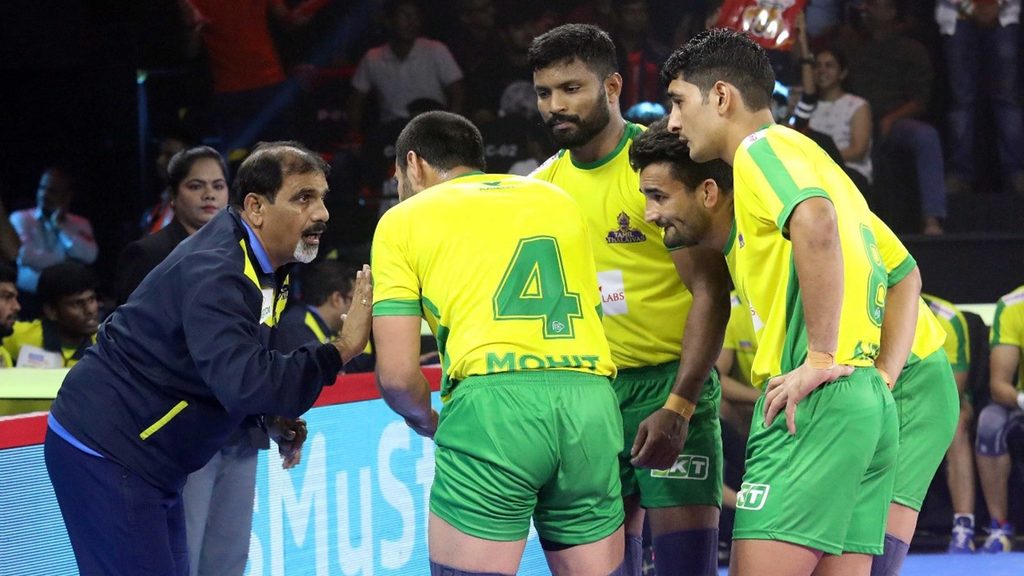 Tamil Thalaivas coach Edacherry Bhaskaran instructs the team during Match 34.