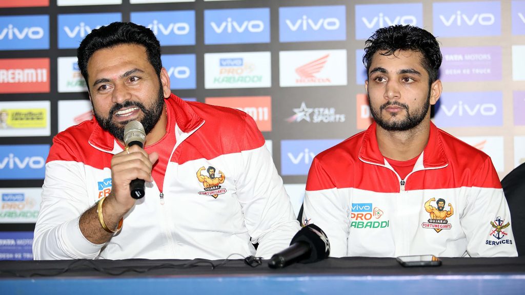 Gujarat Fortunegiants coach Manpreet Singh and raider Rohit Gulia at the post match press conference.