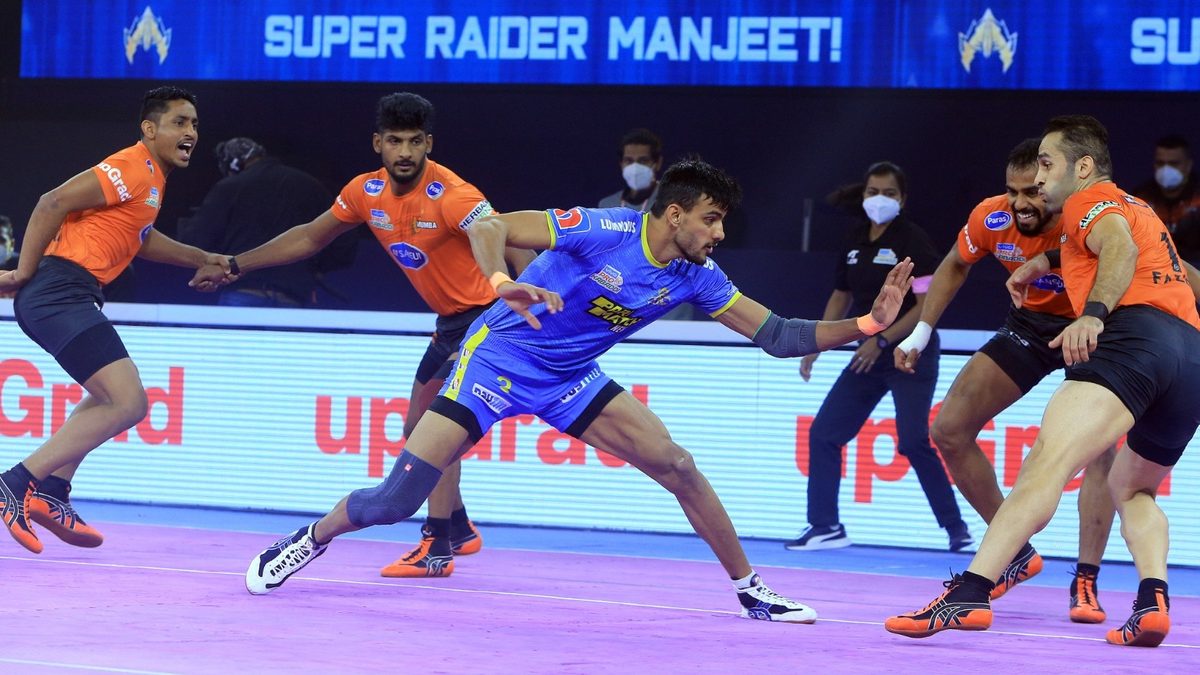 Manjeet of Tamil Thalaivas tries to get a point off Fazel Atrachali of U Mumba in Match 95 of VIVO Pro Kabaddi League Season 8