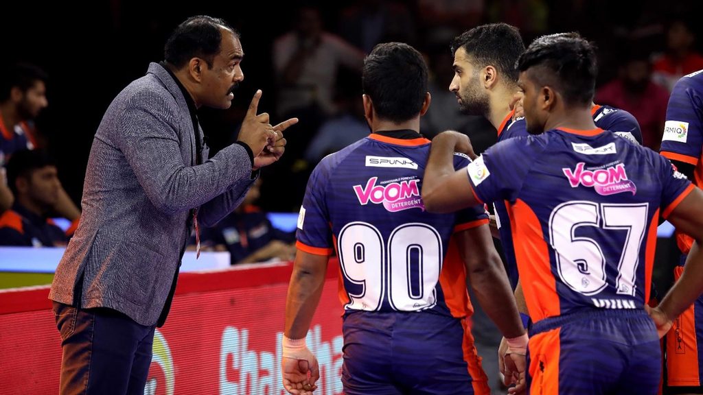 Bengal Warriors coach BC Ramesh talks to his team during a match.