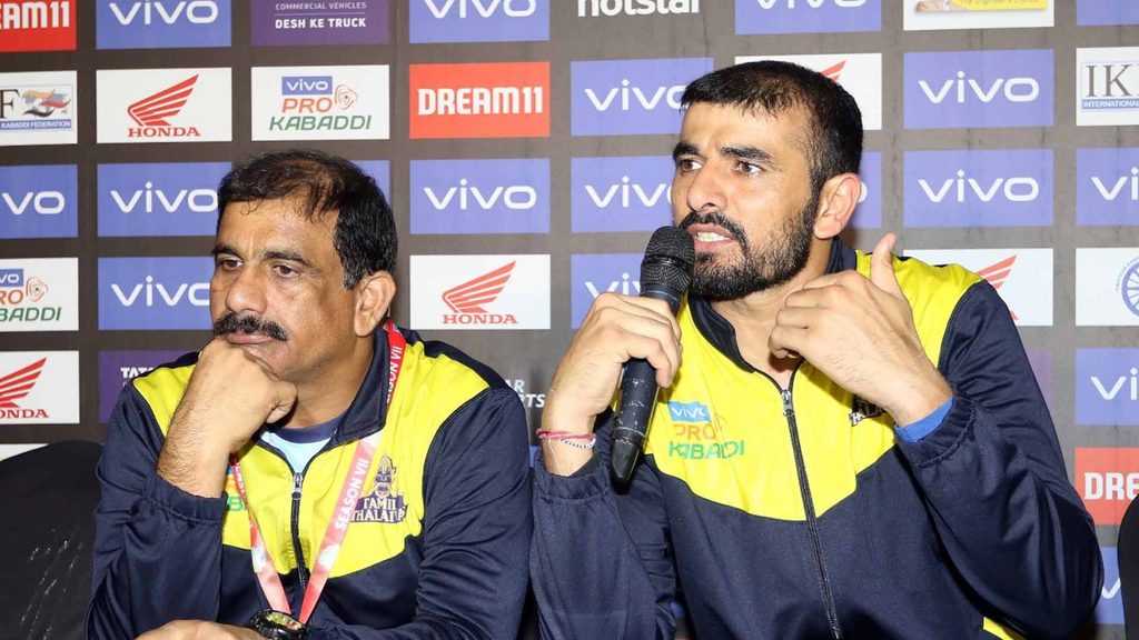 Tamil Thalaivas coach E. Bhaskaran and skipper Ajay Thakur at the post-match press conference.