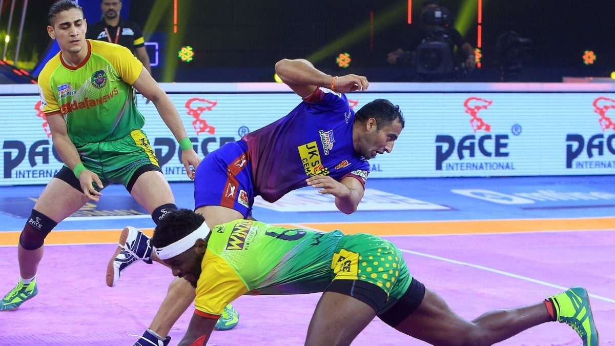 Sandeep Narwal of Dabang Delhi K.C. avoids a tackle from Daniel Odhiambo of Patna Pirates in Match 126 of VIVO Pro Kabaddi League Season 8