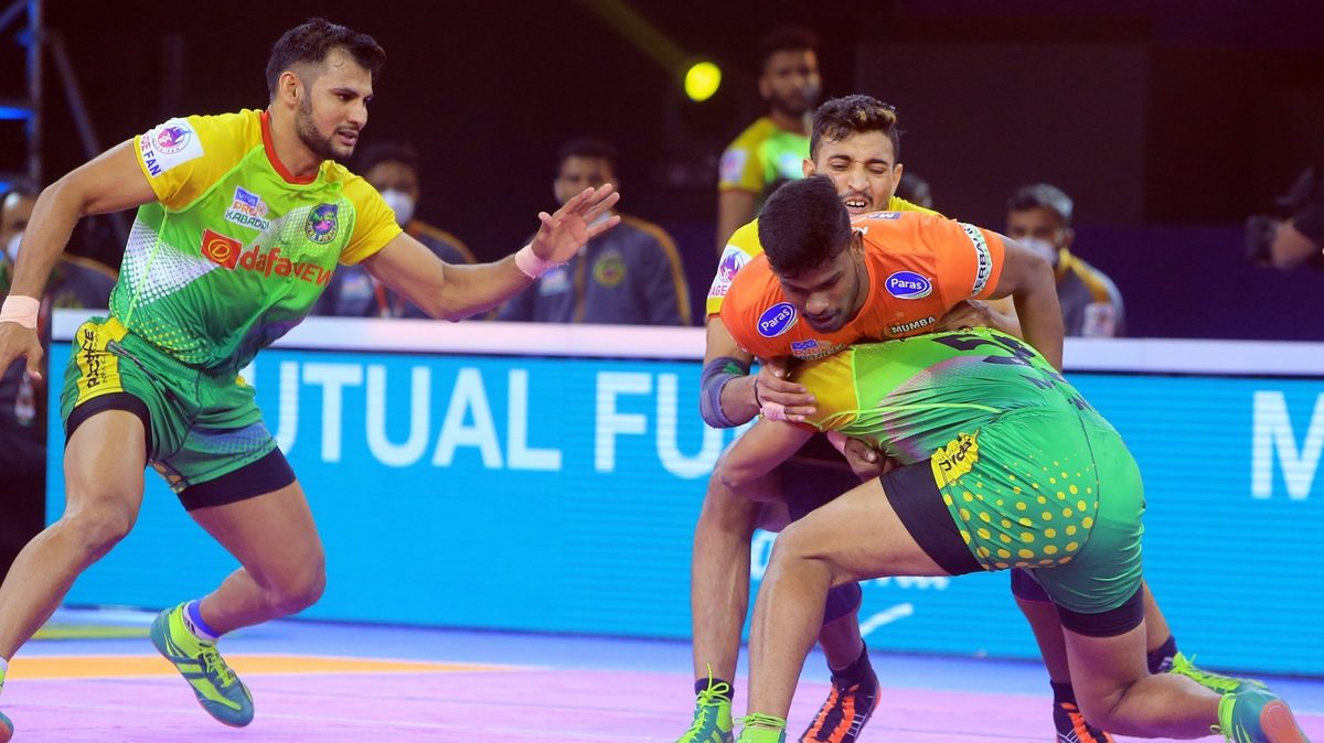 Ajith Kumar of U Mumba fights his way through the Patna Pirates' defence in Match 103 of VIVO Pro Kabaddi League Season 8