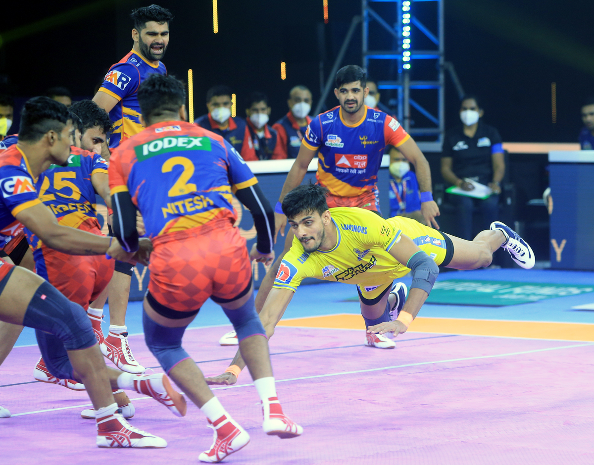 Manjeet of Tamil Thalaivas displays his acrobatic skills against the U.P. Yoddha's defence in Match 104 of VIVO Pro Kabaddi League Season 8