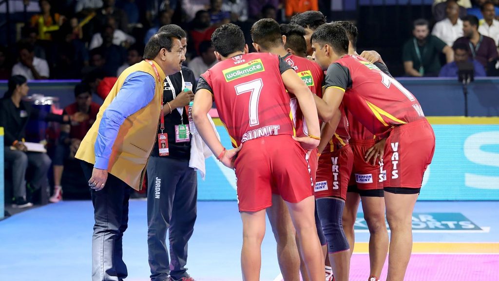 Bengaluru Bulls coach Randhir Singh Sehrawat giving players advice during a match.