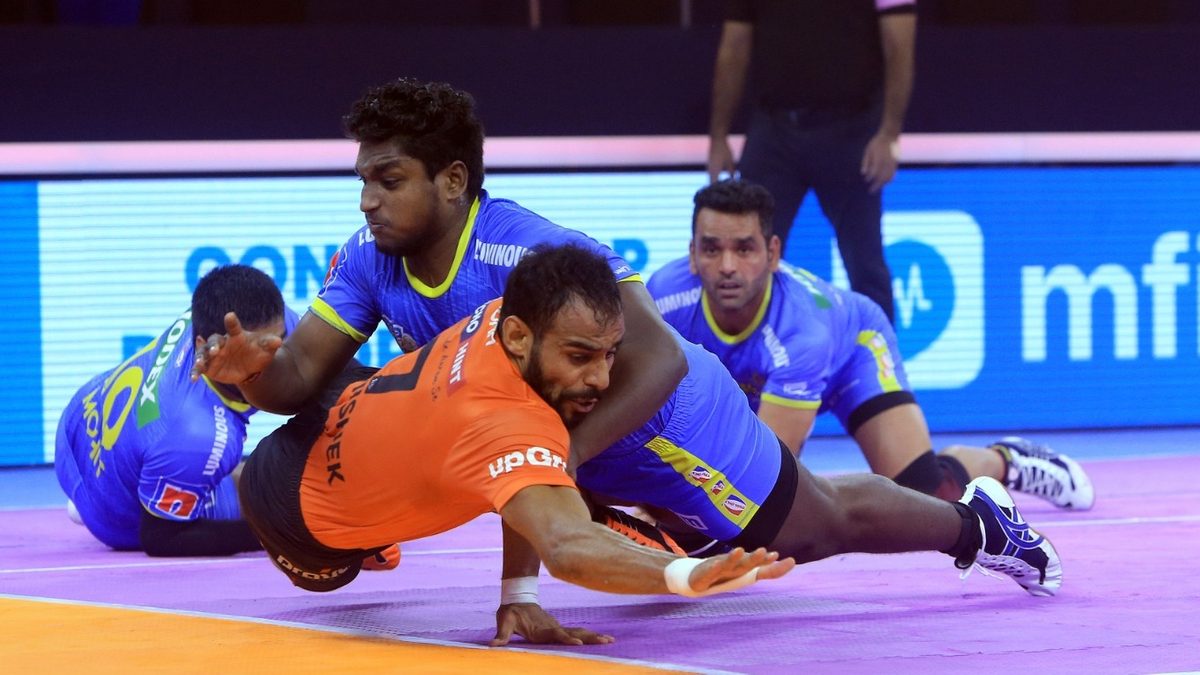 Abhishek Singh of U Mumba is blocked by M Abhishek of Tamil Thalaivas in Match 95 of VIVO Pro Kabaddi League Season 8