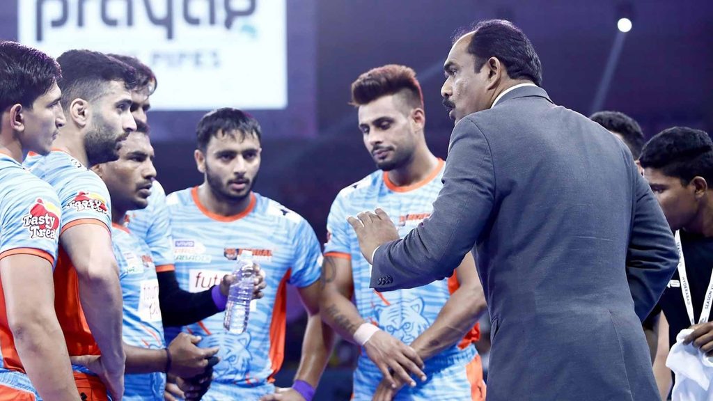 Bengal Warriors coach BC Ramesh guides his team during a time-out.