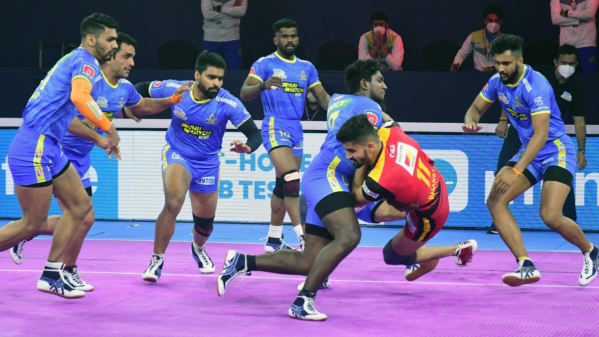 Bharat of Bengaluru Bulls is grabbed by M. Abhishek of Tamil Thalaivas in Match 83 of VIVO Pro Kabaddi League Season 8