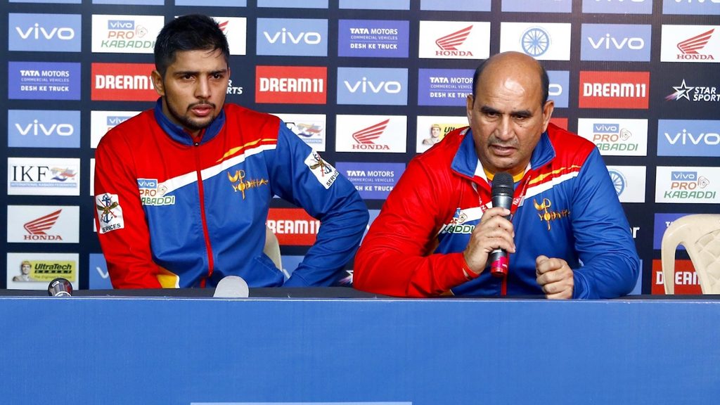 U.P. Yoddha skipper Nitesh Kumar and assistant coach Arjun Singh at the post-match press conference.