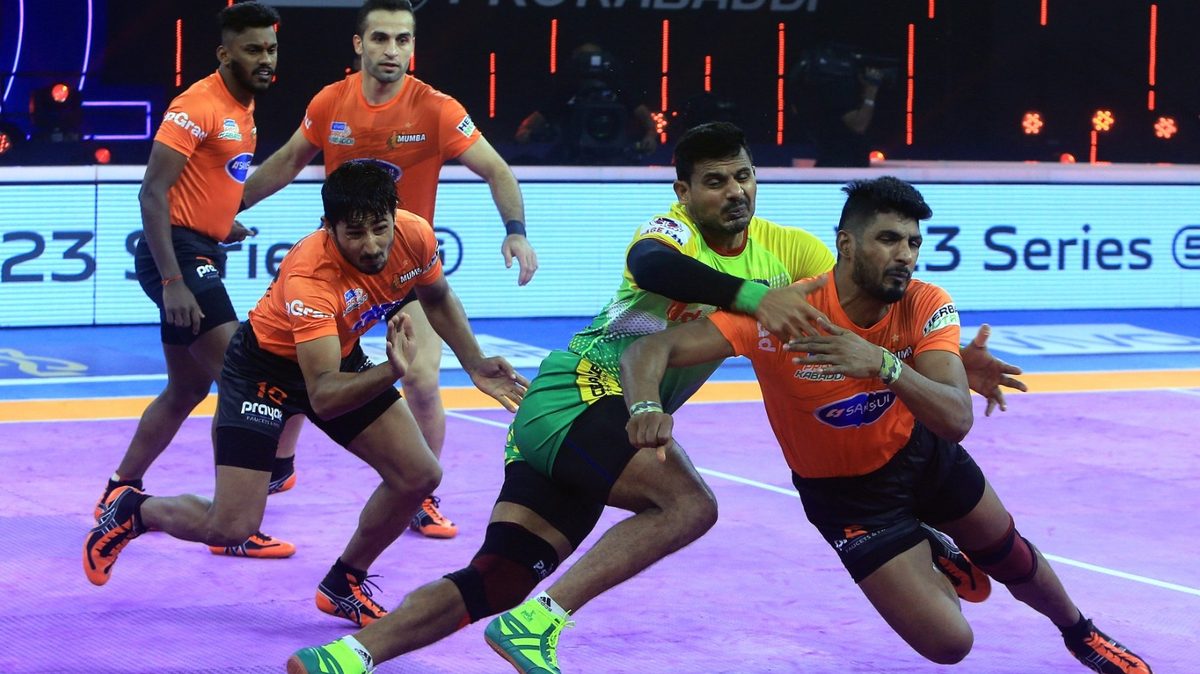 Prashant Kumar of Patna Pirates is met by a crowded U Mumba defense in Match 47 of VIVO Pro Kabaddi League Season 8.