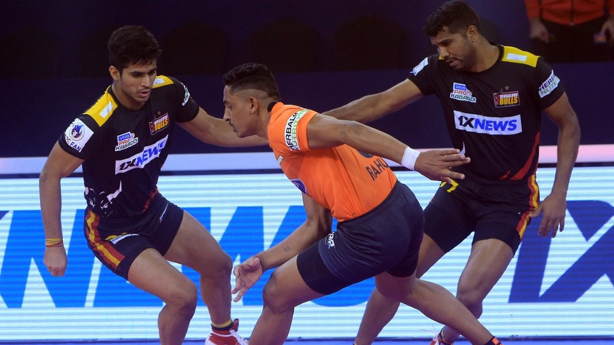 U Mumba's Rahul Sethpal attempts a raid against Bengaluru Bulls in Match 78 of VIVO Pro Kabaddi League Season 8.