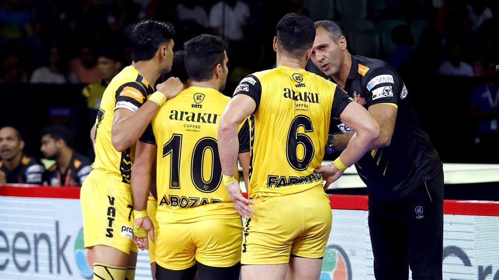 Telugu Titans’ coach Gholamreza Mazandarani gives his players instructions.  