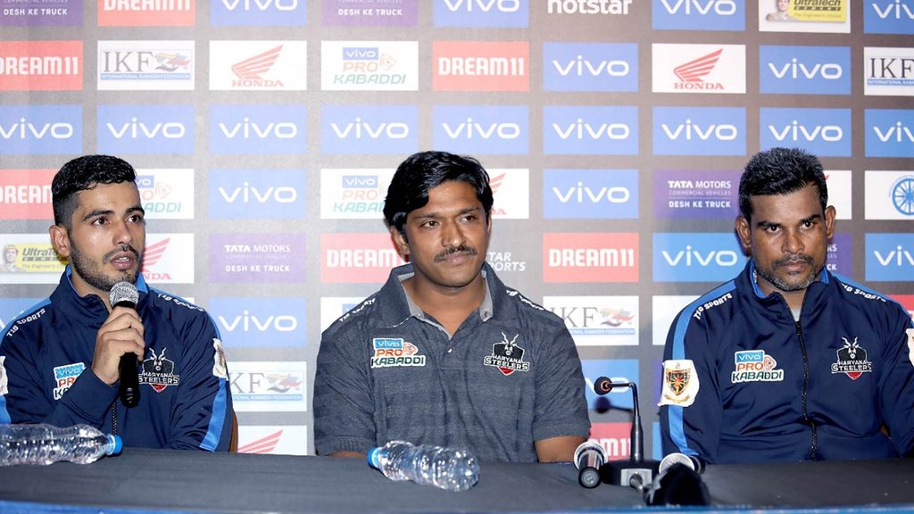Haryana Steelers raider Vikash Kandola, assistant coach Mandar Shetty and captain Dharmaraj Cheralathan at the post-match press conference.
