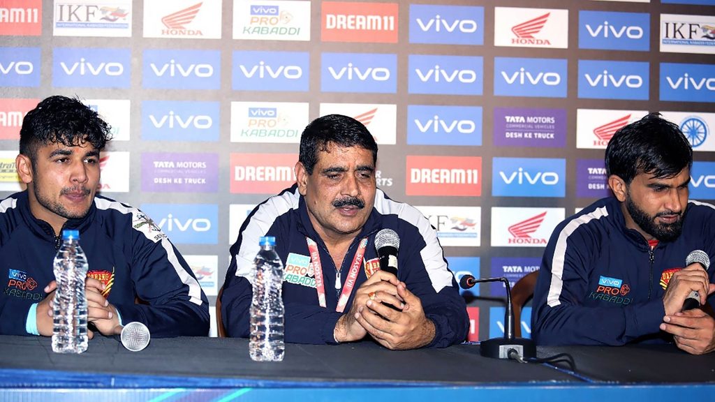 Dabang Delhi K.C. raider Naveen Kumar, coach Krishan Kumar Hooda and captain Joginder Narwal at the post-match press conference.