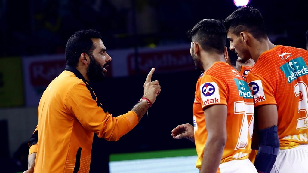 Puneri Paltan coach Anup Kumar gives instructions to his players.