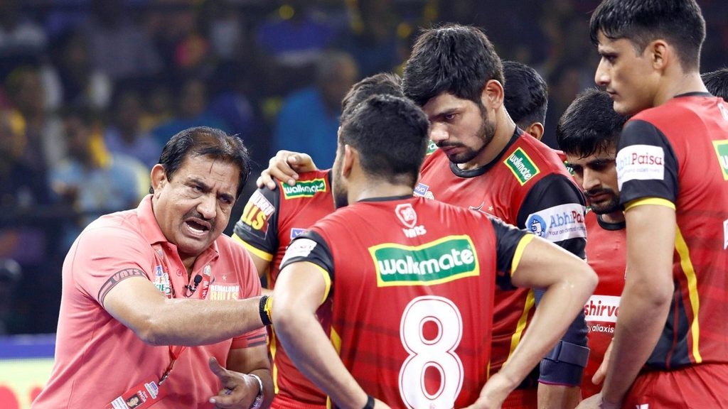 Bengaluru Bulls' coach Randhir Singh Sehrawat explains a gameplan to his team.