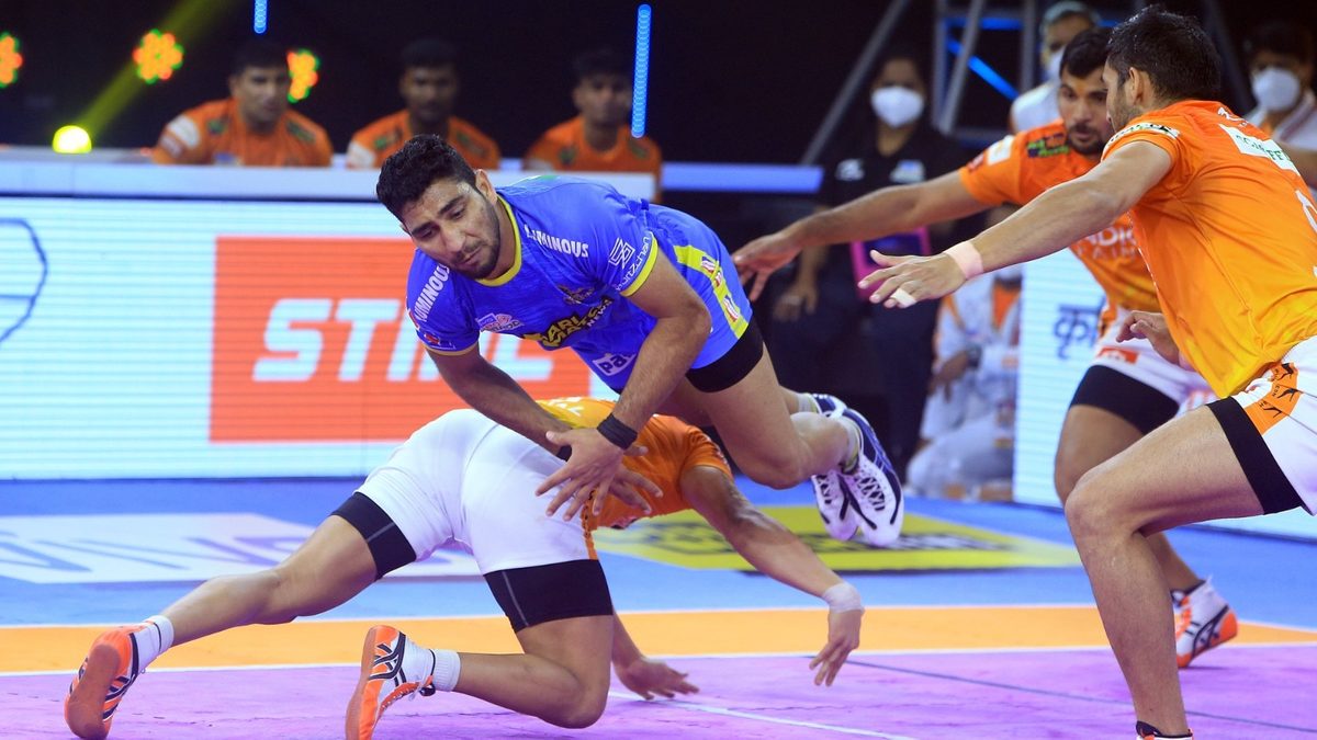 Himanshu of Tamil Thalaivas jumps over a Puneri Paltan defender in Match 121 of VIVO Pro Kabaddi League Season 8