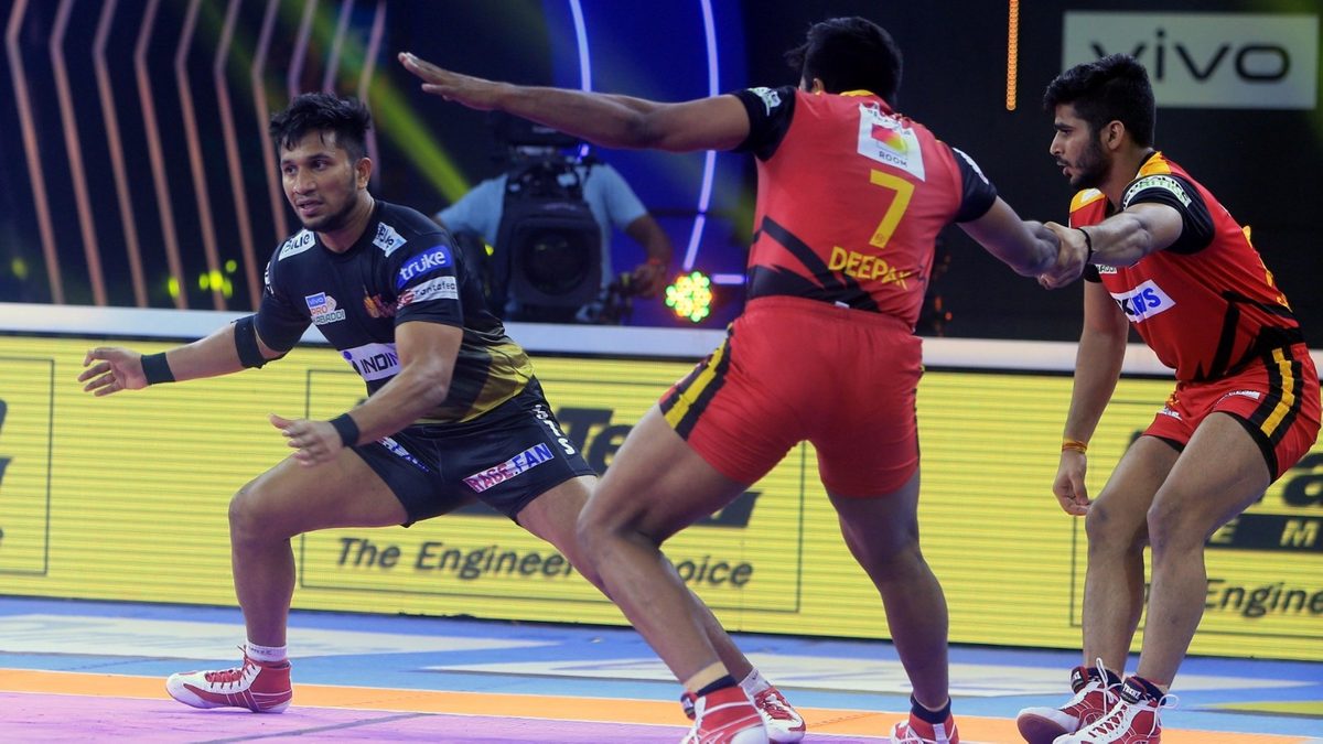 Telugu Titans' T. Adarsh in action in Match 74 of VIVO Pro Kabaddi League Season 8.