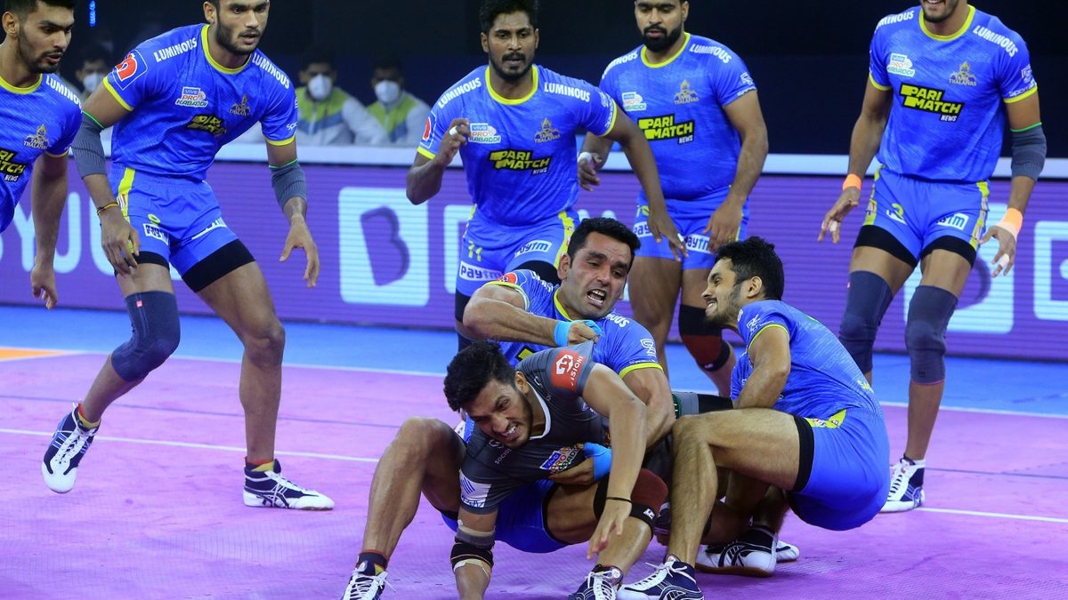Meetu of Haryana Steelers is grabbed by Surjeet Singh and Sagar Krishna of Tamil Thalaivas in Match 45 of VIVO Pro Kabaddi League Season 8.
