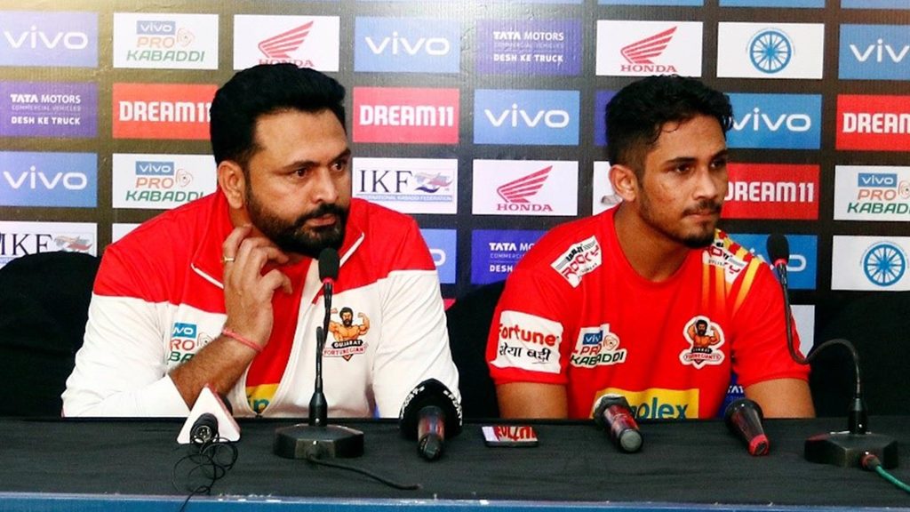 Coach Manpreet Singh and Sunil Kumar at the post-match press conference.