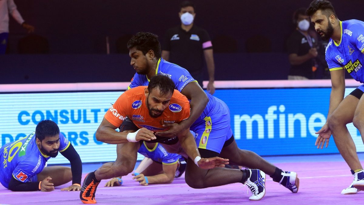 Abhishek Singh of U Mumba is stopped by the brute force of M Abhishek of Tamil Thalaivas in Match 95 of VIVO Pro Kabaddi League Season 8