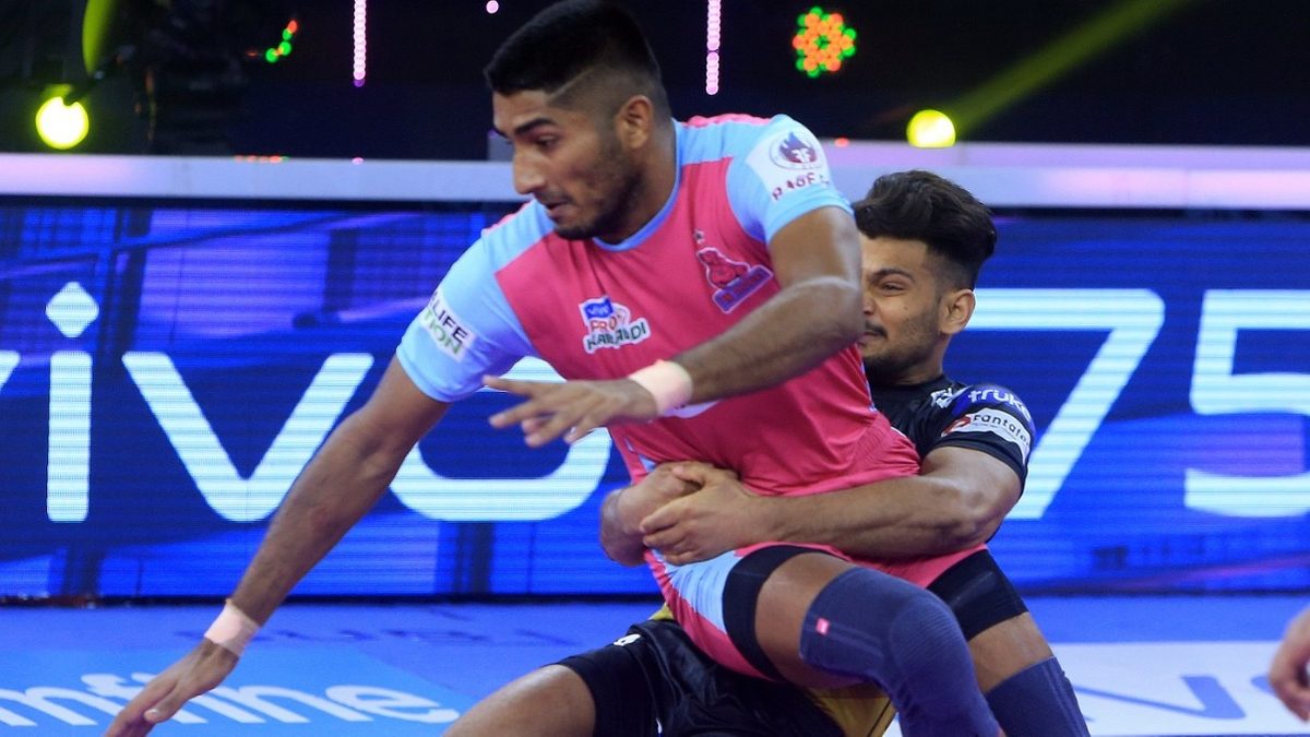 Brijendra Singh Chaudhary is unable to get past the Telugu Titans' defence in Match 123 of VIVO Pro Kabaddi League Season 8