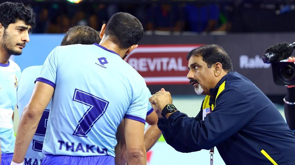 Coach E Bhaskaran has a word with his players during Tamil Thalaivas’ clash against U.P. Yoddha.