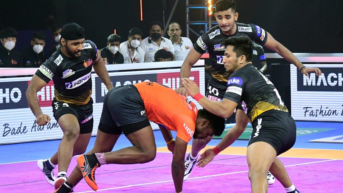 Ajith Kumar of U Mumba tries to get past Adarsh of Telugu Titans in Match 41 of VIVO Pro Kabaddi League Season 8.