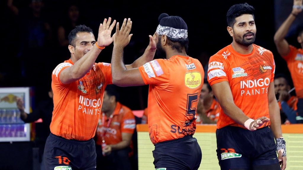 U Mumba’s Surinder Singh gets congratulated by Sandeep Narwal for his heroics.