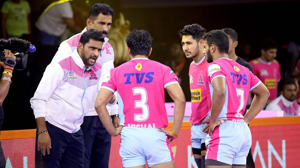 Coach Srinivas Reddy passing instructions to his team.