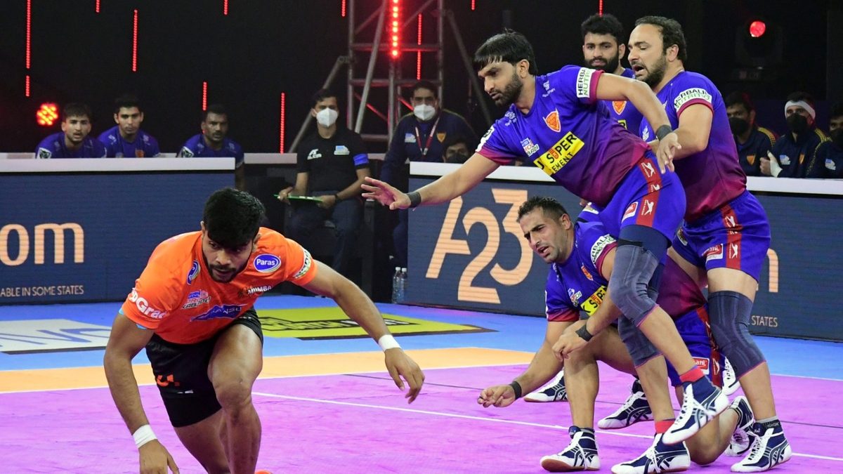 Shivam of U Mumba secures a point for his team against the Dabang Delhi K.C. defense in Match 85 of VIVO Pro Kabaddi League Season 8